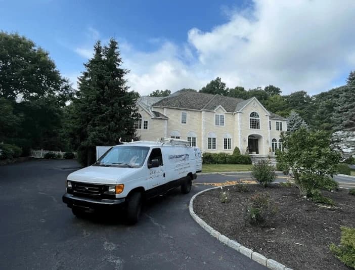 Fairview Park Power Washing technician performing thorough gutter cleaning service in Fairview Park