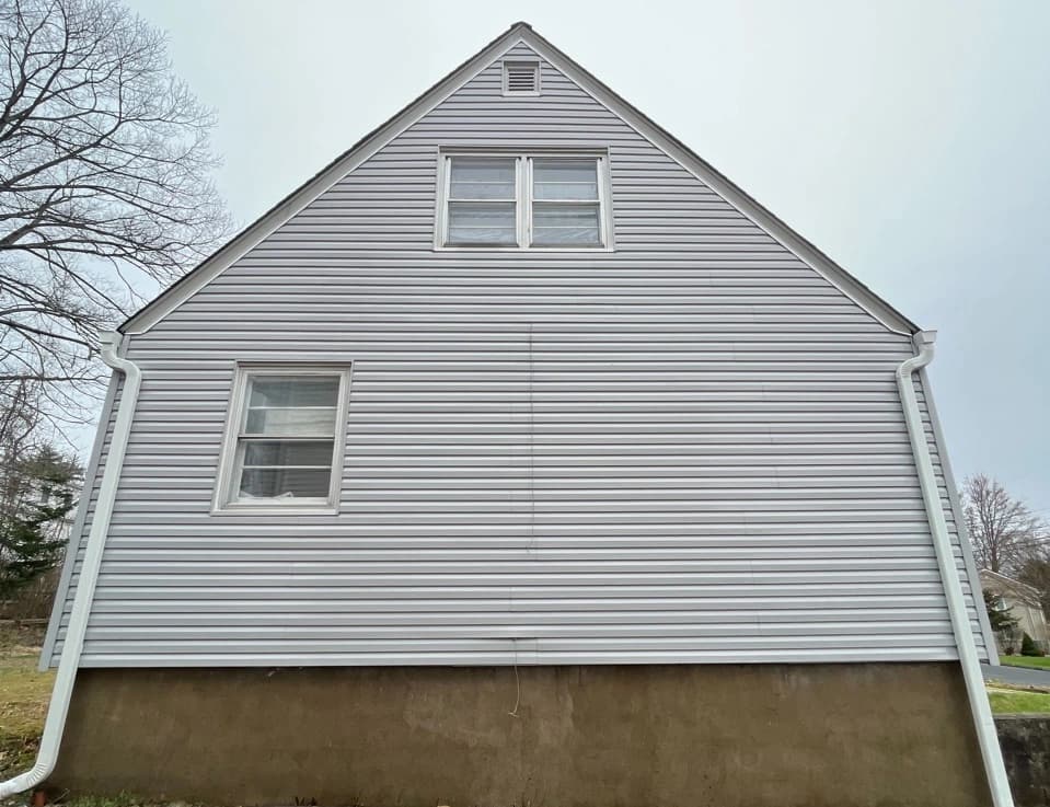 Fairview Park Power Washing technician performing detailed house washing in Fairview Park residential area